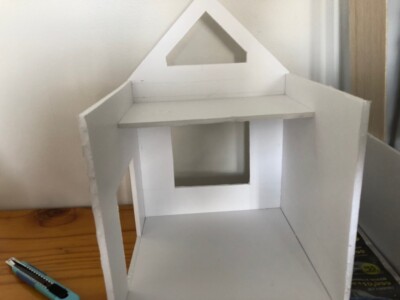 The base is made out of foam board. Base