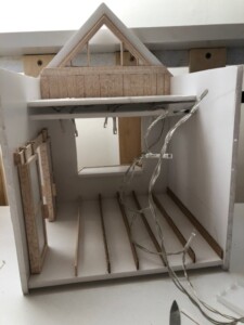 Lights, doors, floor elevation, and wood cladding added. Lights, doors, floor elevation