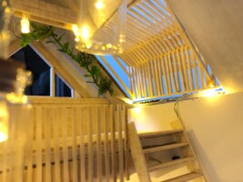 Opening balcony where it is a skylight window when closed that transforms into a balcony when opened. Skylight window